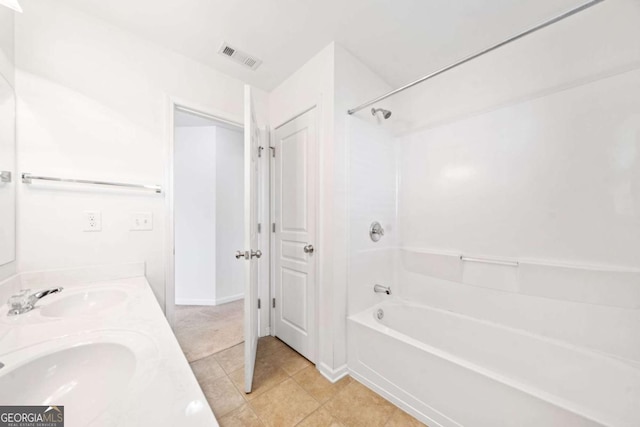 bathroom with double vanity, shower / bath combination, a sink, and visible vents