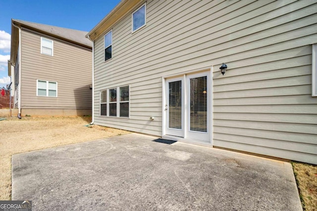 back of house with a patio area