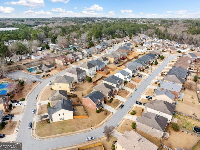 birds eye view of property with a residential view