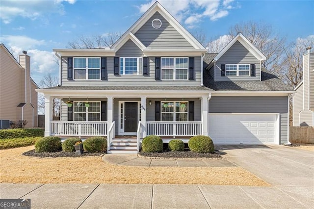 view of front of house with driveway, a porch, central AC, a shingled roof, and a garage