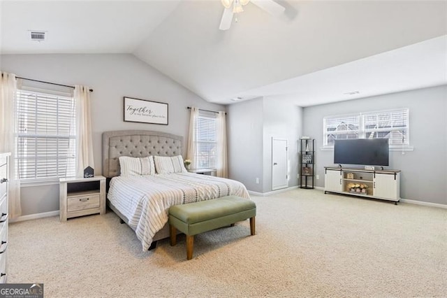 carpeted bedroom with visible vents, ceiling fan, baseboards, and lofted ceiling