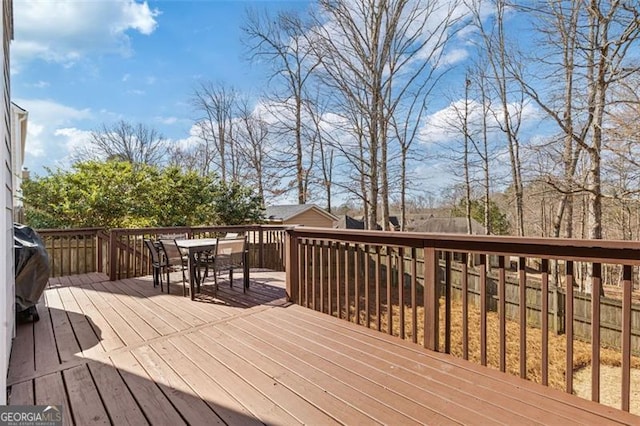 deck featuring outdoor dining space