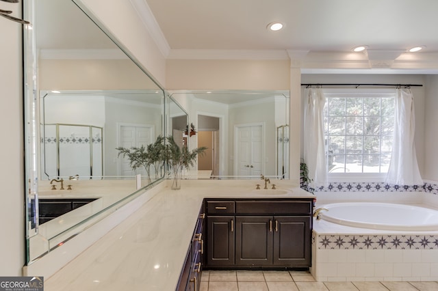 bathroom featuring tile patterned floors, a shower stall, crown molding, and vanity