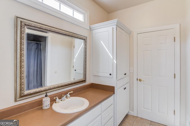 bathroom with vanity and tile patterned floors