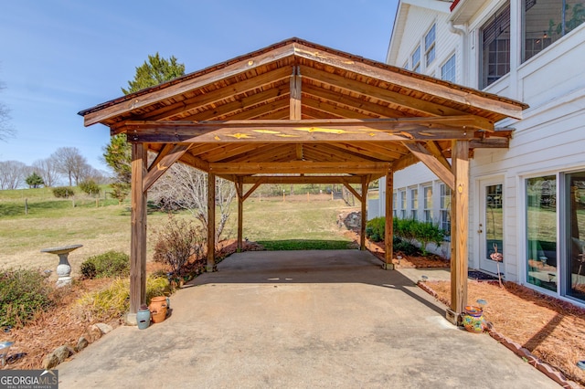 exterior space with driveway and a carport