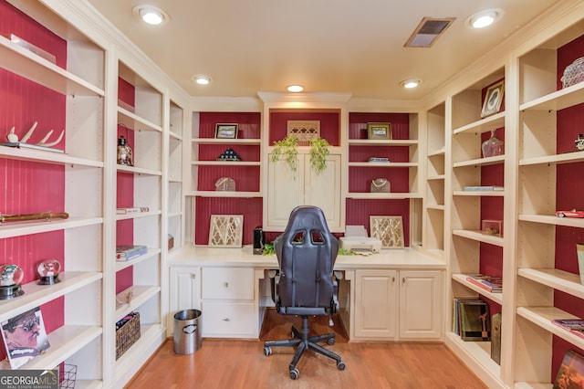 office featuring light wood-style flooring, visible vents, and recessed lighting