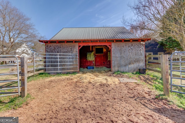 view of outbuilding featuring an exterior structure and an outdoor structure