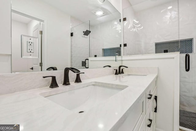 bathroom with a sink, a shower stall, and tile walls