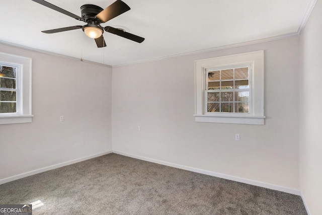 1887 Green Valley Rd, Griffin, GA 30224 - carpeted spare room featuring a ceiling fan, baseboards, ornamental molding, and a wealth of natural light