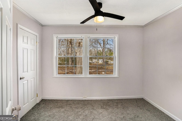 1887 Green Valley Rd, Griffin, GA 30224 - carpeted spare room featuring a ceiling fan, baseboards, and crown molding