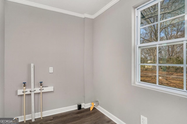 1887 Green Valley Rd, Griffin, GA 30224 - laundry room featuring laundry area, crown molding, baseboards, and dark wood-type flooring