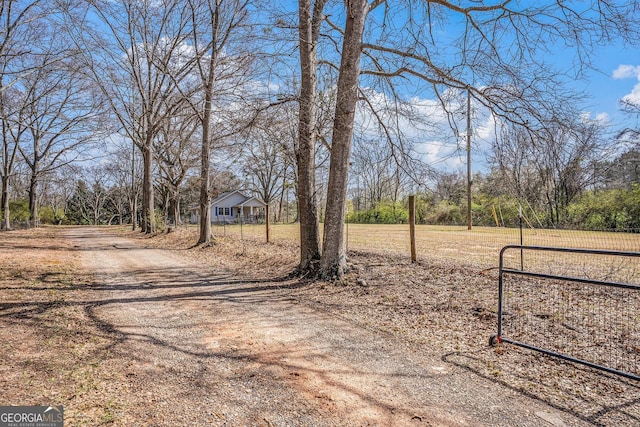1887 Green Valley Rd, Griffin, GA 30224 - view of road featuring dirt driveway