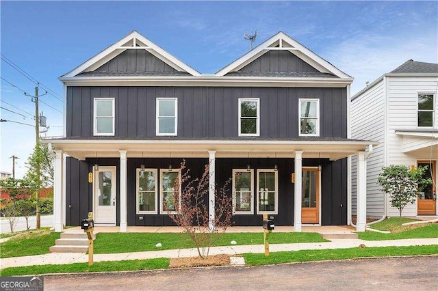 view of front of home with covered porch and board and batten siding