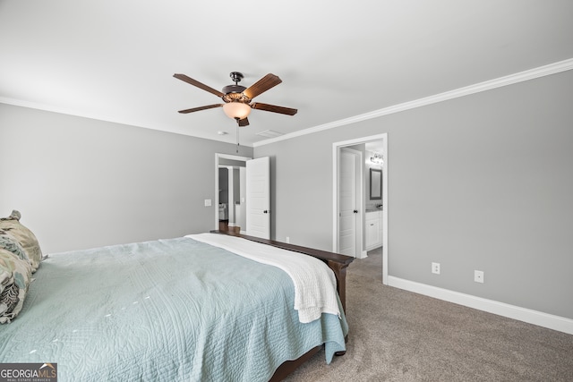 bedroom with ensuite bathroom, carpet floors, a ceiling fan, baseboards, and ornamental molding