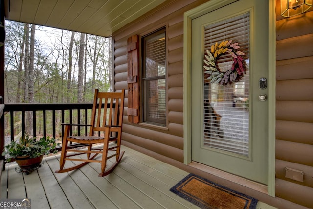 wooden terrace with covered porch