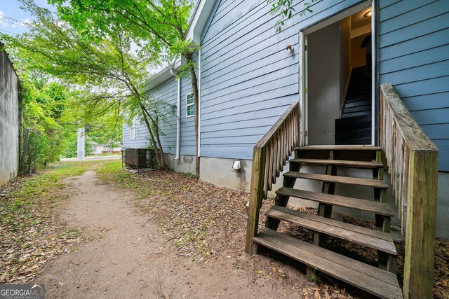 property entrance with cooling unit