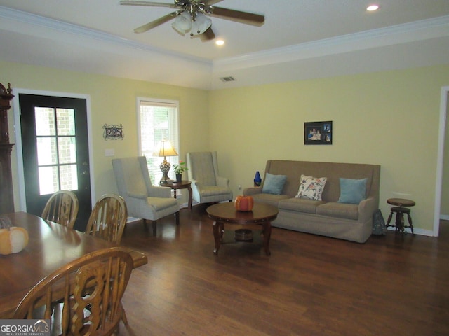 living room featuring recessed lighting, wood finished floors, a ceiling fan, visible vents, and ornamental molding