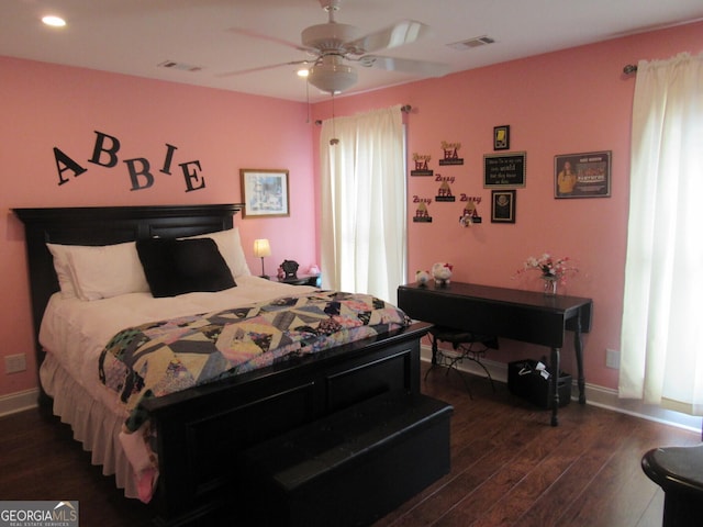 bedroom featuring dark wood-style floors, baseboards, and visible vents