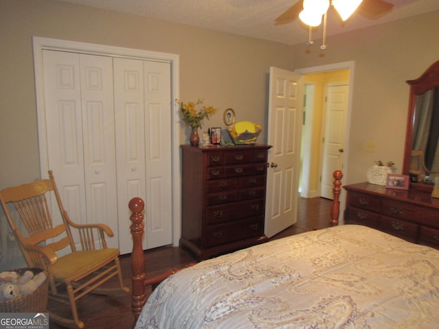 bedroom with ceiling fan and a closet