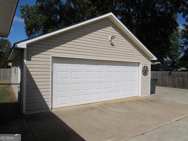 detached garage with fence