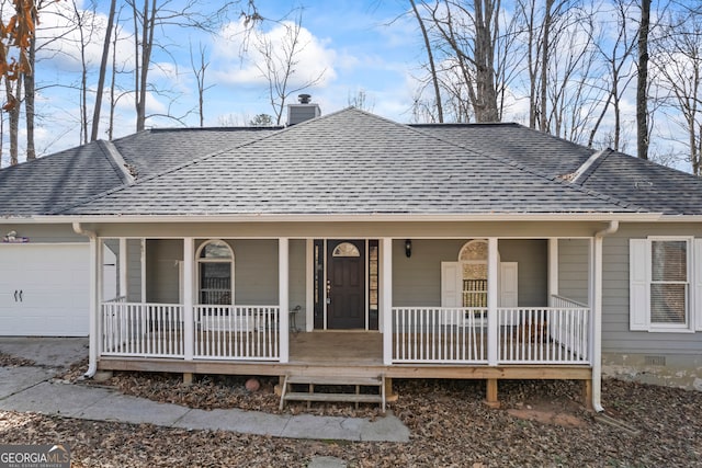 view of front of property with an attached garage, covered porch, roof with shingles, crawl space, and a chimney