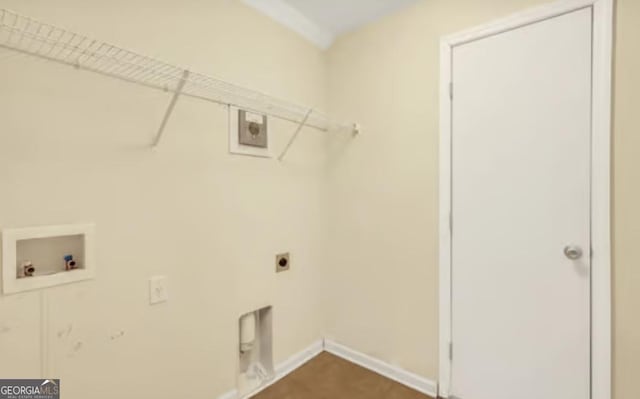 washroom with laundry area, hookup for a washing machine, electric dryer hookup, and baseboards