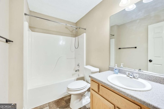 full bathroom with toilet,  shower combination, and vanity