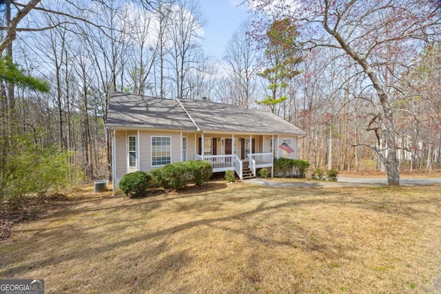 264 Pioneer Trl, Dallas, GA 30132 - ranch-style house featuring a porch and a front yard