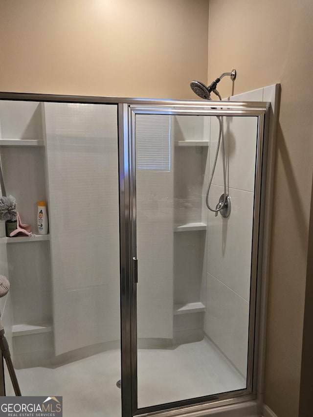 full bathroom with a stall shower