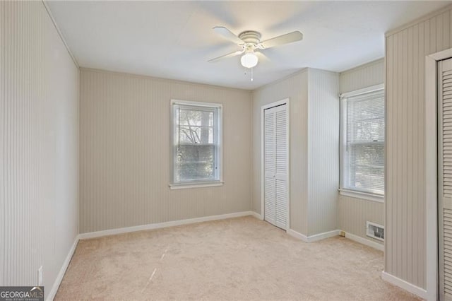 5812 Dogwood Cir, Austell, GA 30168 - unfurnished bedroom featuring carpet flooring and a ceiling fan