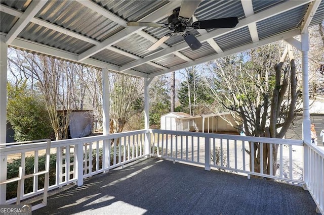 5812 Dogwood Cir, Austell, GA 30168 - deck with a ceiling fan and a storage shed