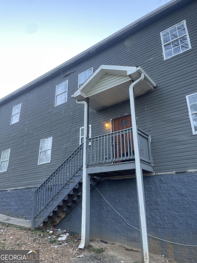 view of home's exterior with stairway