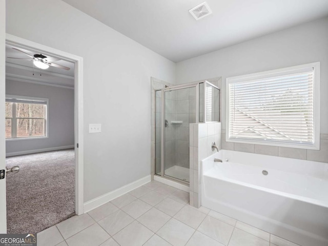 full bath featuring a stall shower, visible vents, a bath, and tile patterned floors