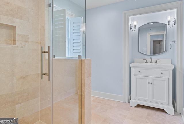 204 E Liberty St, Savannah, GA 31401 - bathroom with a shower stall, vanity, baseboards, and tile patterned flooring