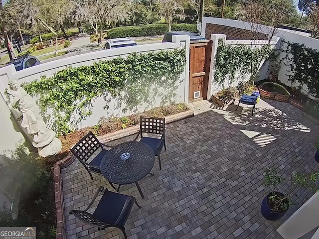 view of patio with fence