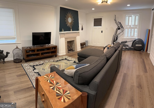204 E Liberty St, Savannah, GA 31401 - living room with recessed lighting, wood finished floors, crown molding, a fireplace, and baseboards