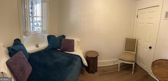 204 E Liberty St, Savannah, GA 31401 - living area featuring wood finished floors and healthy amount of natural light