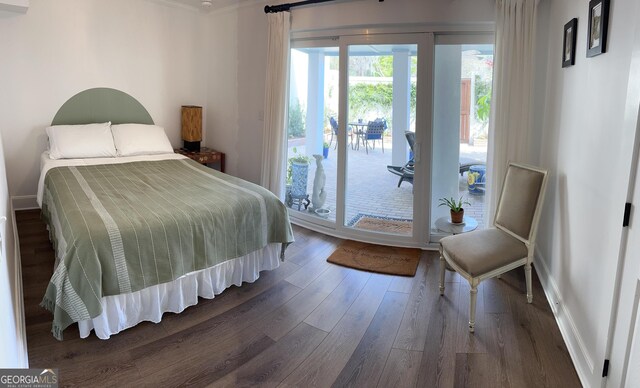 204 E Liberty St, Savannah, GA 31401 - bedroom with access to outside, dark wood finished floors, and crown molding