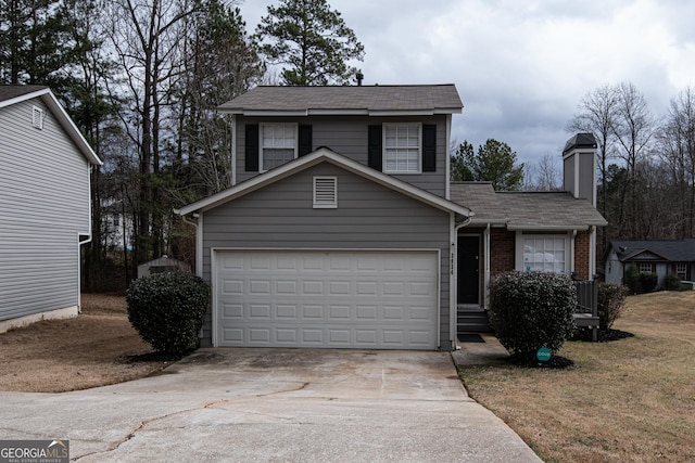 view of front of home with concrete driveway and brick siding