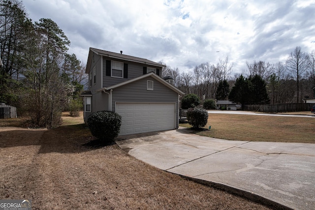 view of property exterior with driveway, a lawn, and an attached garage