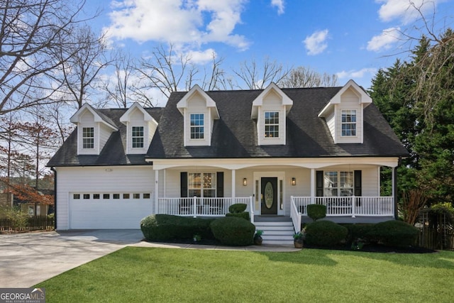 cape cod-style house featuring a porch, a garage, a shingled roof, concrete driveway, and a front yard