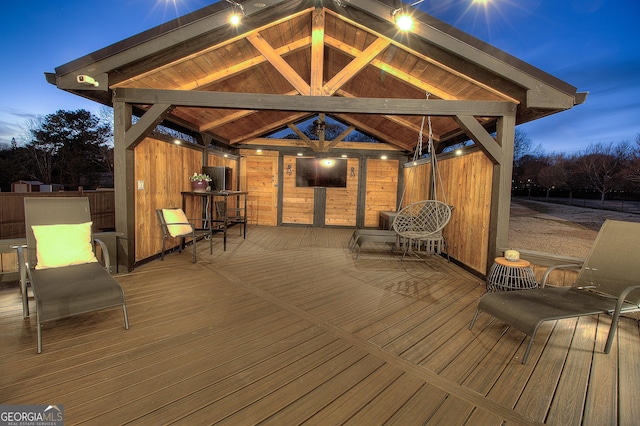 wooden terrace with a gazebo