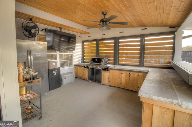 view of patio with ceiling fan and grilling area