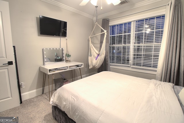 bedroom with baseboards, carpet, visible vents, and crown molding