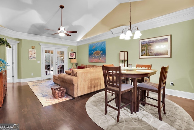 dining space featuring french doors, crown molding, baseboards, and wood finished floors