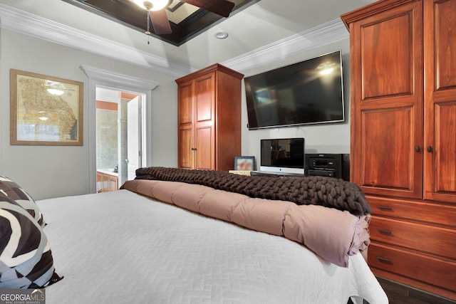 bedroom featuring ensuite bathroom and ornamental molding