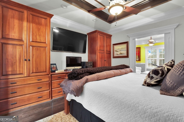 bedroom featuring dark wood-style floors, ceiling fan, and ornamental molding