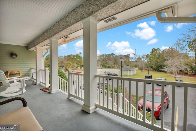 balcony featuring visible vents