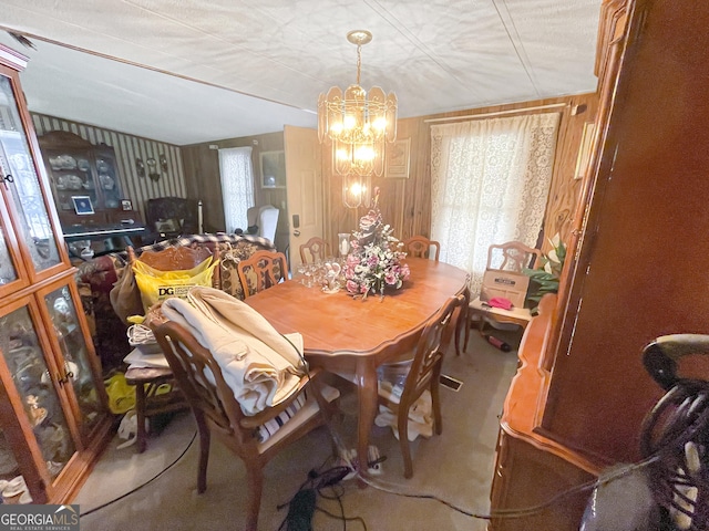 dining room featuring a notable chandelier