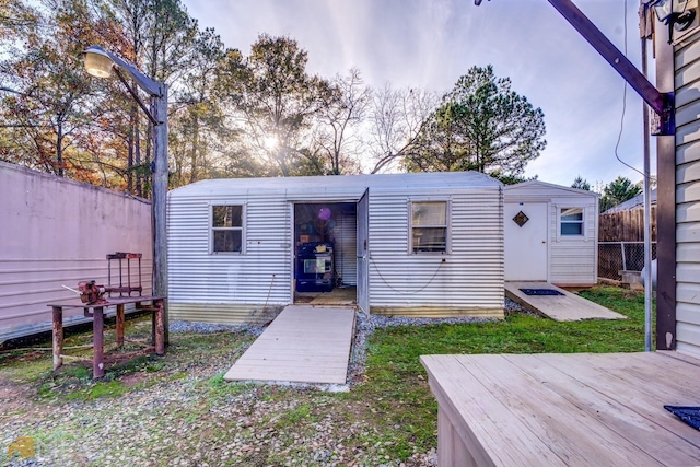 view of outbuilding featuring an outbuilding and a fenced backyard